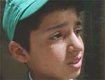 A Palestinian boy cries outside the house of Hamas leader Abdel Aziz Rantisi during his funeral, Sunday. (AP/Hatem Moussa)